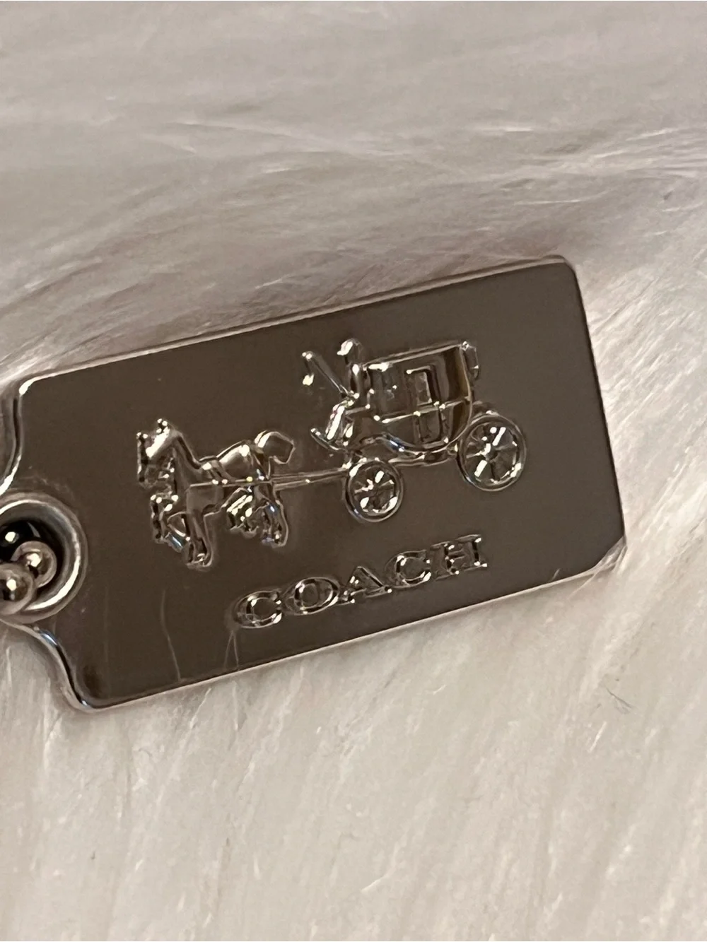 Coach Silver Tone Embossed Horse & Carriage Dog Tag Keychain